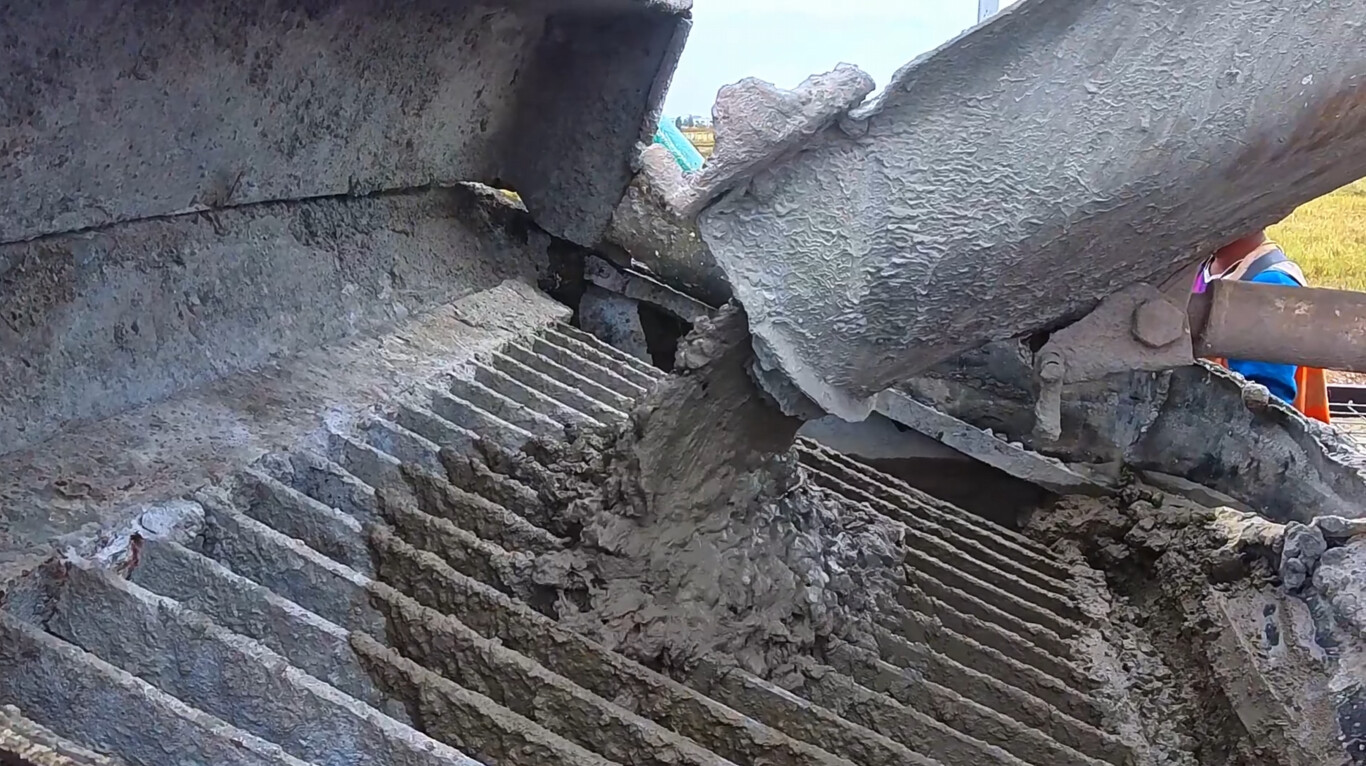 Concrete being poured from truck for foundation in Cathedral, CA